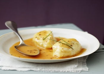 Quenelles of pike, sauce in the Pastis Henri Bardouin